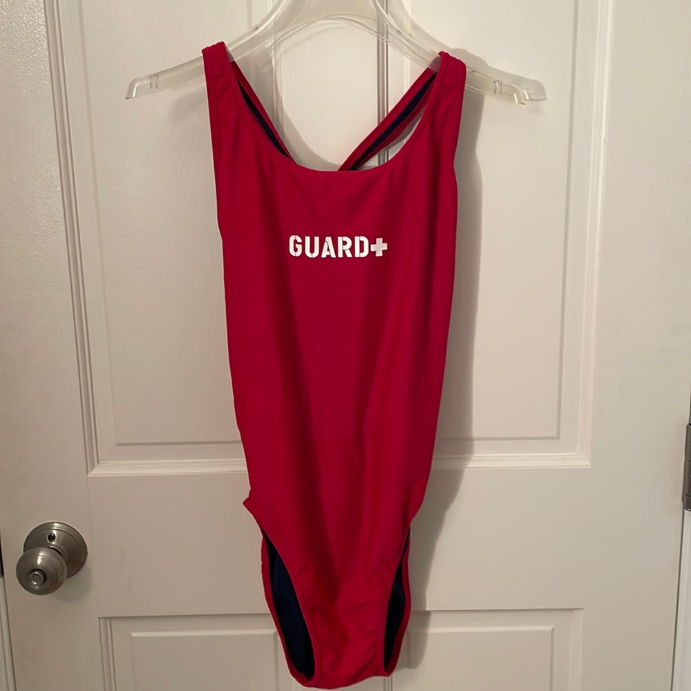 Small red lifeguard swimsuit.